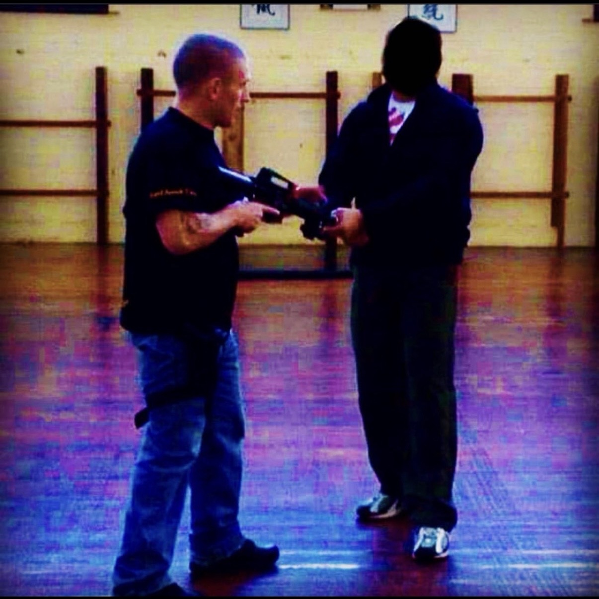 Firearm retention and disarm drill